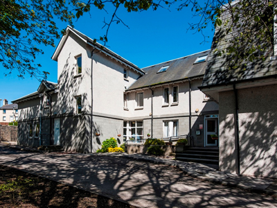 Torry Care Home Exterior: A white and grey building