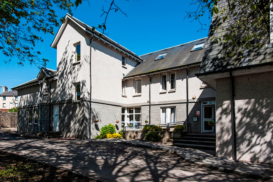 Torry Care Home Exterior: A white and grey building