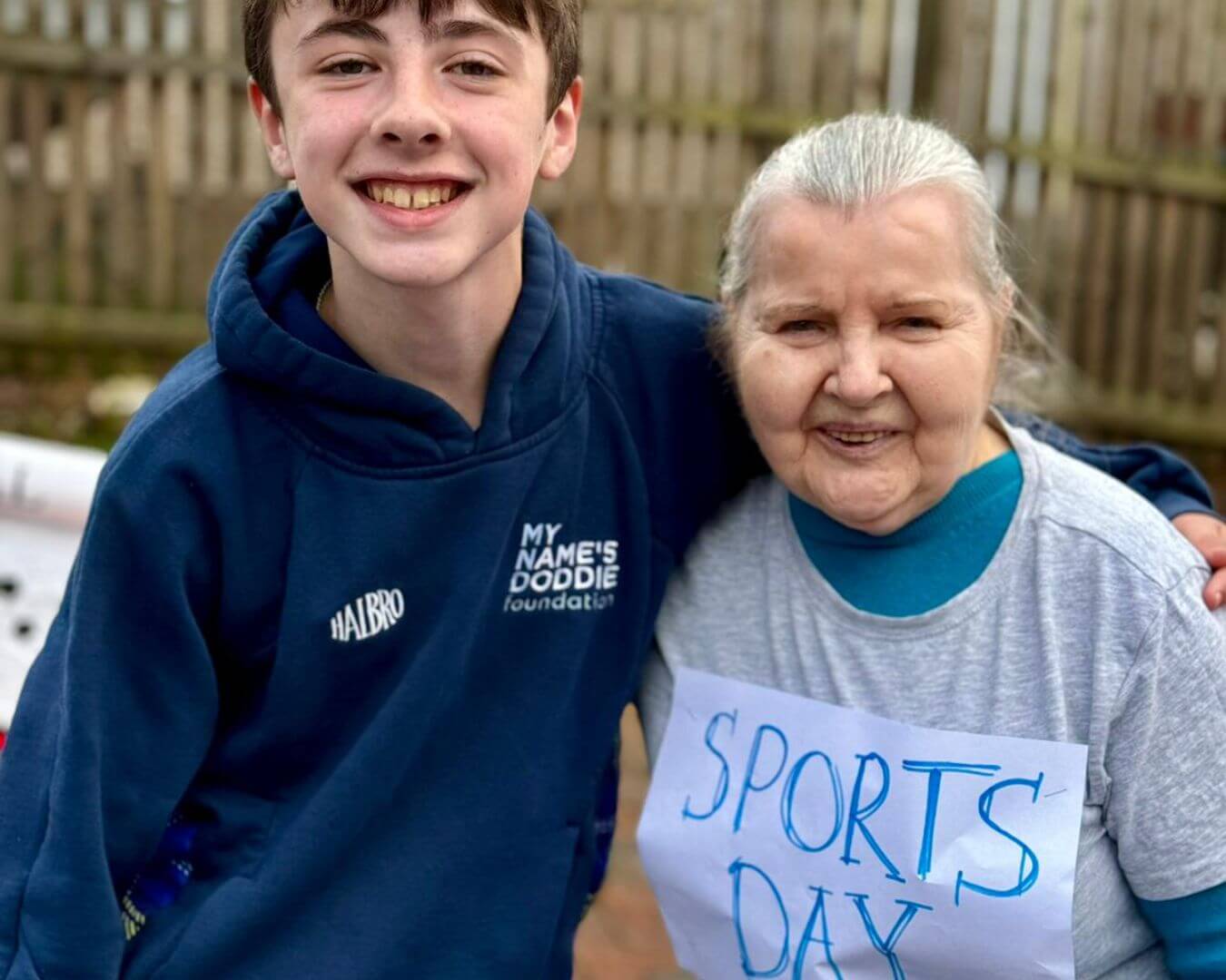 Elizabeth White with St John Paul II Primary School pupil during sports day