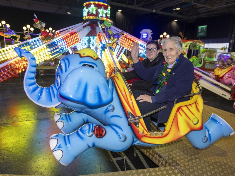 Student Care Assistant, and Whitecraigs Care Home; Iain Harris 91, on a ride at the Irn-Bru Carnival 