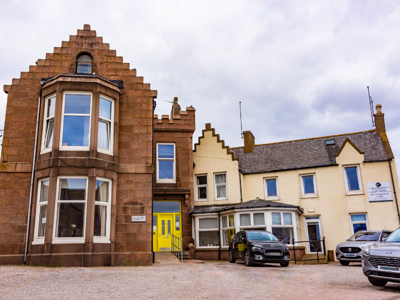 Wyndwell Care Home Exterior. A large brick building in Peterhead, Scotland.