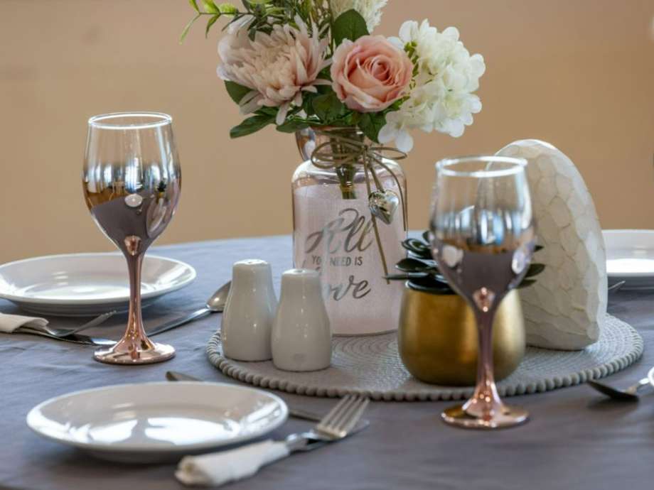 Care home dining table set-up displays the crockery and tableware used for meals