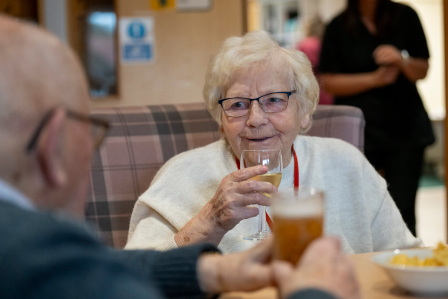 Residents enjoy socialising within the homes bar area