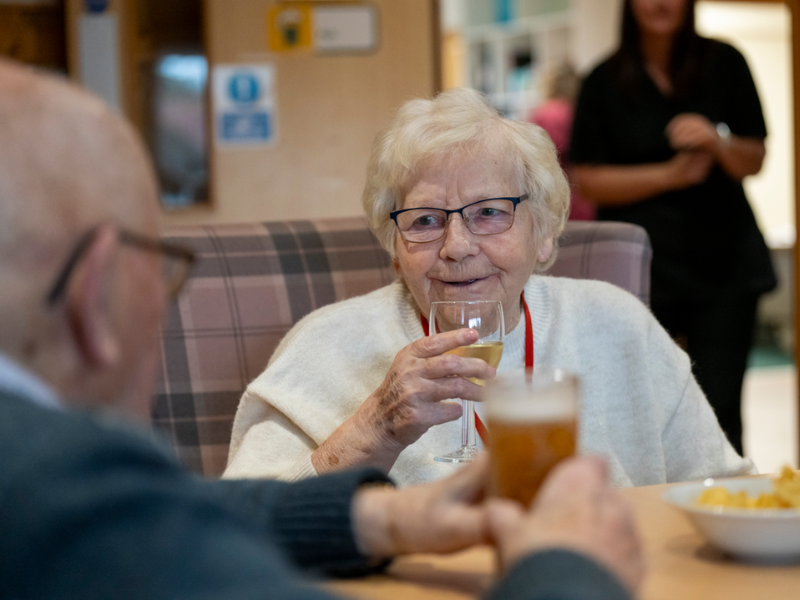 Residents enjoy socialising within the homes bar area