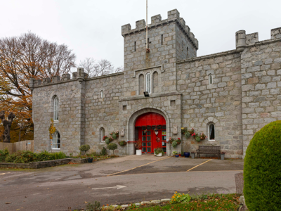 Brick exterior of period property - Persley Castle Care Home, featuring authentic architectural elements of the castle.