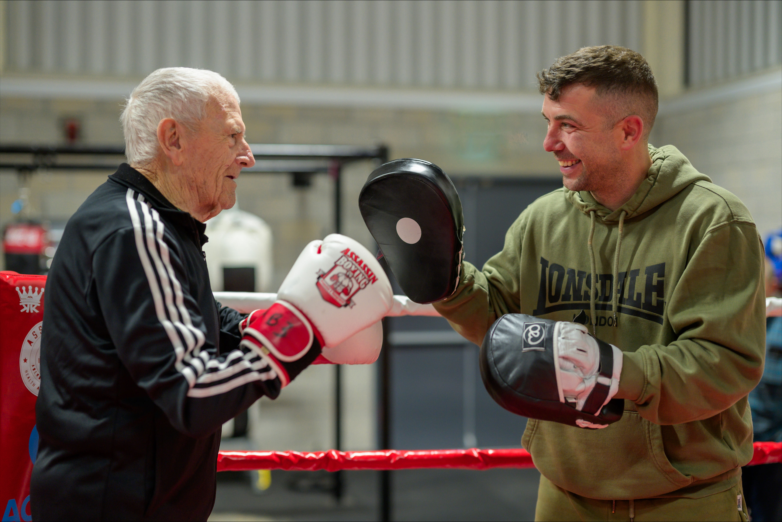 A care home resident completes his wish of sparring with local professional boxer 